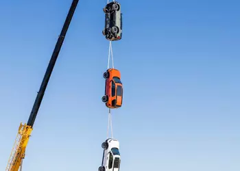 Honda suspended three Passport TrailSport's from a crane to prove their durability