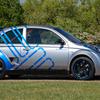 Nissan Micra 350SR на тлі пейзажу