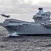 The British aircraft carrier HMS Queen Elizabeth, carrying fifth-generation F-35B Lightning II fighters, has transferred to NATO command for the first time in history-31
