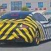 Xiaomi SU7 L extended sedan prototype in camouflage