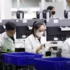 Employees at the AJAX Systems plant in Vietnam