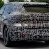 Мініатюра BMW X5 у русі в місті