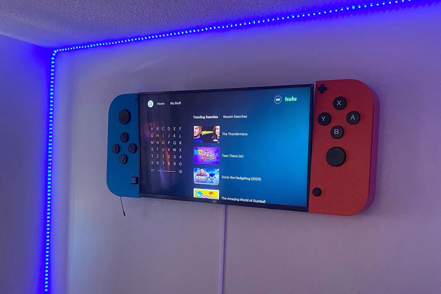 JoyCon-shaped TV cabinets attach to the sides of your television, turning it into a massive Nintendo Switch!