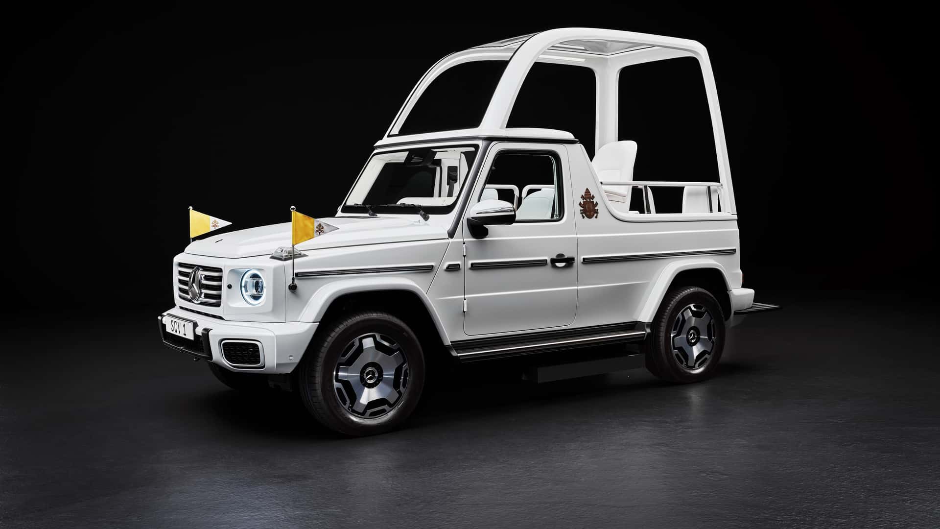 Pope Francis in the new electric Papamobile