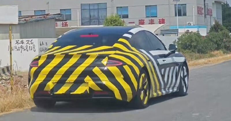 Xiaomi SU7 L extended sedan prototype in camouflage