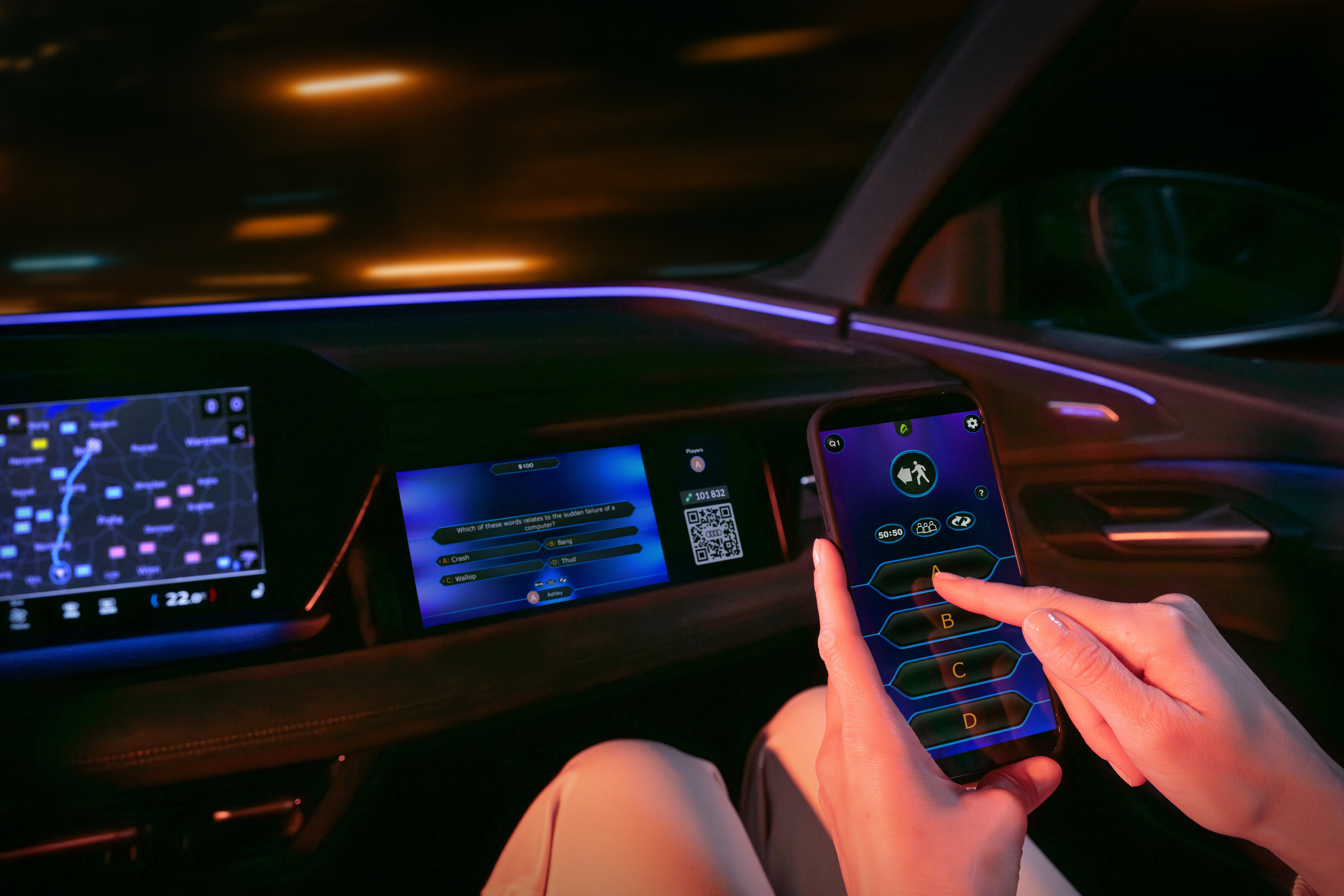 Пассажиры играют в игры в автомобиле Audi