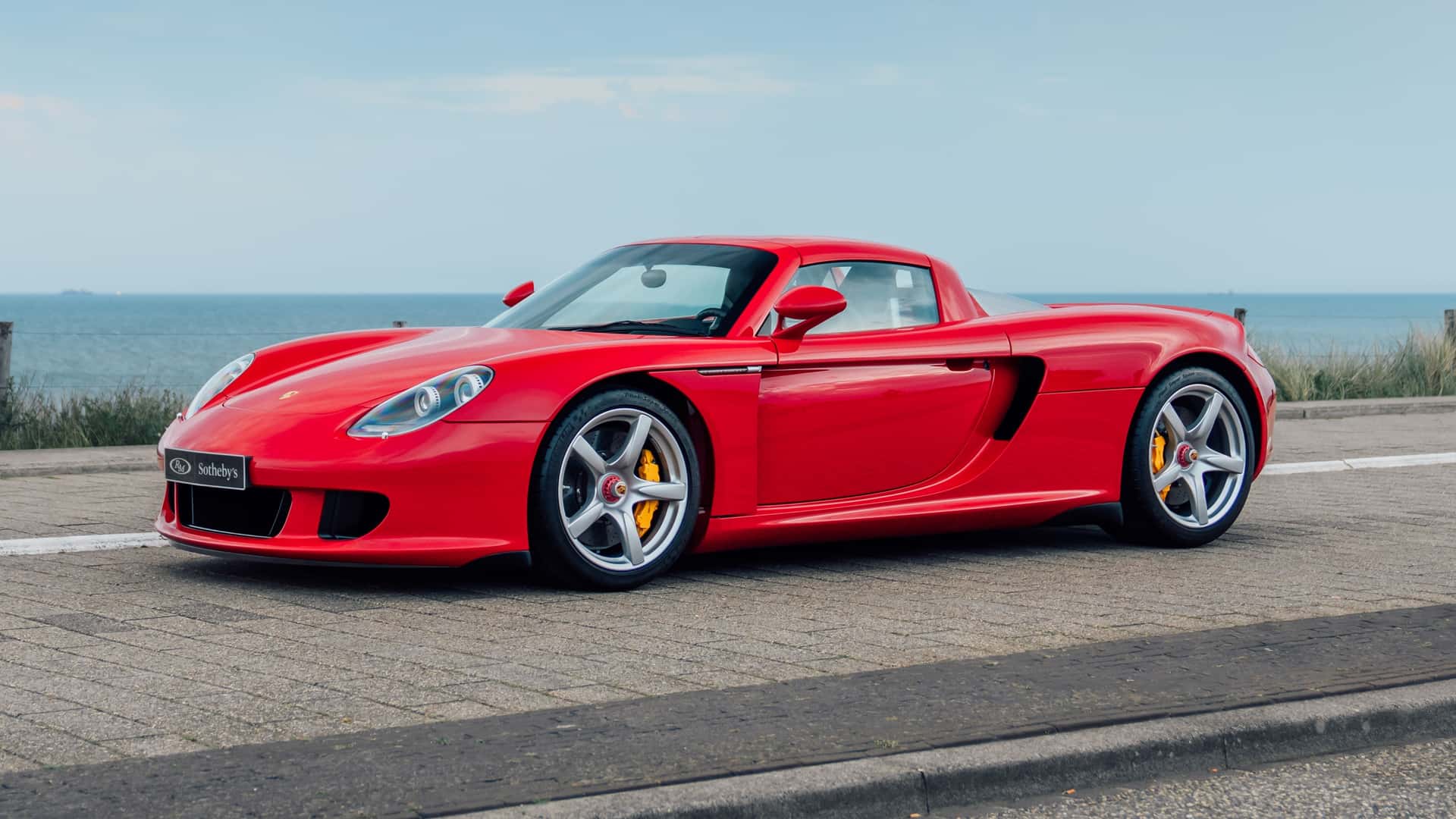 Aerial view of Porsche Carrera GT in Guards Red on display