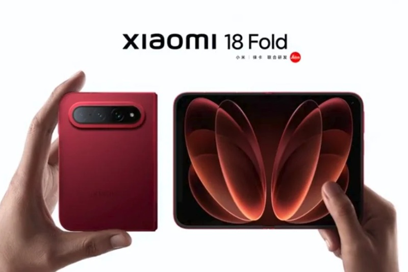 Xiaomi 18 Fold in its red colorway, folded — roughly passport-sized with a 5.38-inch cover display.